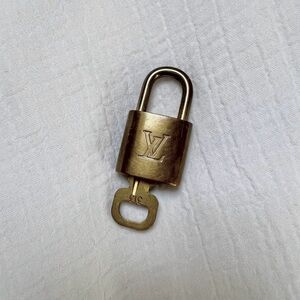 Louis Vuitton lock and key Vintage 100% Authentic